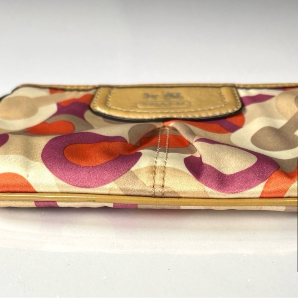 Coach Optic C Colorful Patterned Wristlet
Orange pink cream. Patent Leather - Picture 7 of 11